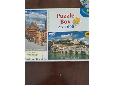 Abbildung: Puzzle - Rothenburg und St. Nazaire (je 1000 Teile)