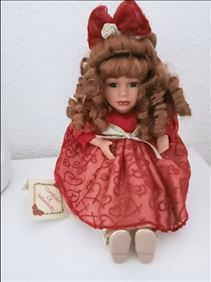 Abbildung: Neu/unbenutzt.Vintage Musikpuppe 