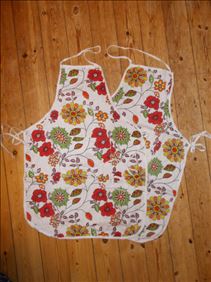 Abbildung: Partnerlook mit Vintagemuster: Tausche 2 Küchenschürzen..