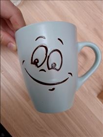 Abbildung: Tasse mit Gesicht 