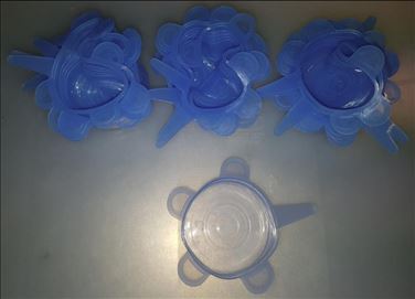 Abbildung: Insgs. 15 Silikondeckel, total dehnbar, benutzt